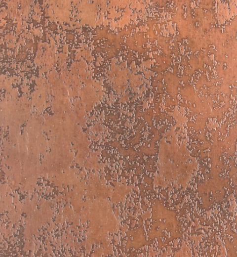 Etched and aged stainless steel